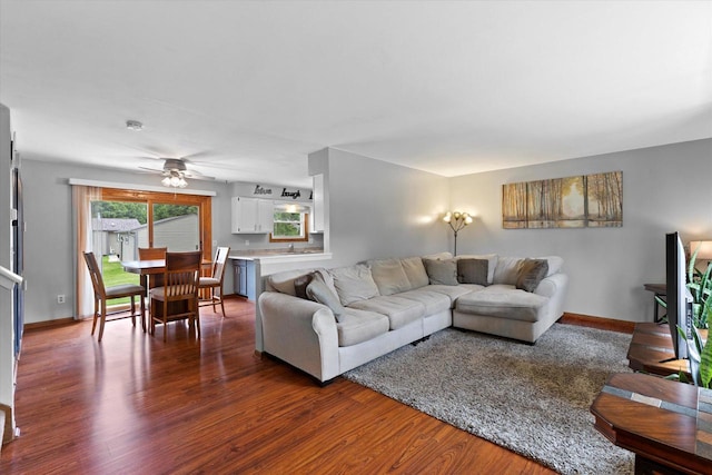 2332 Hughes Ln, Waukesha, WI 53188 - living area with dark wood finished floors and a ceiling fan