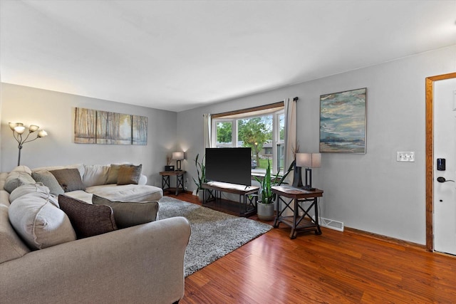 2332 Hughes Ln, Waukesha, WI 53188 - living room featuring wood finished floors and baseboards