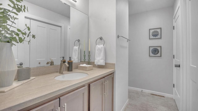 814 N 15th St Unit B, Sheboygan, WI 53081 - bathroom with vanity and baseboards