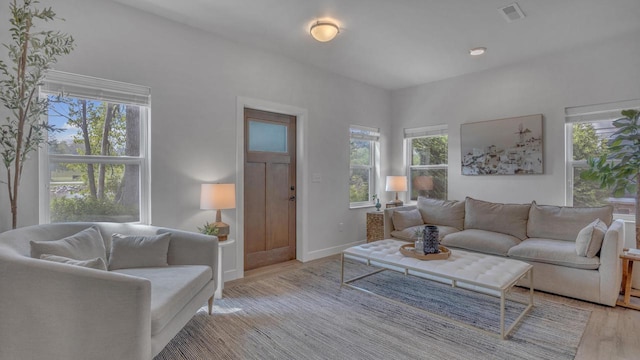 814 N 15th St Unit B, Sheboygan, WI 53081 - living room featuring wood finished floors and baseboards
