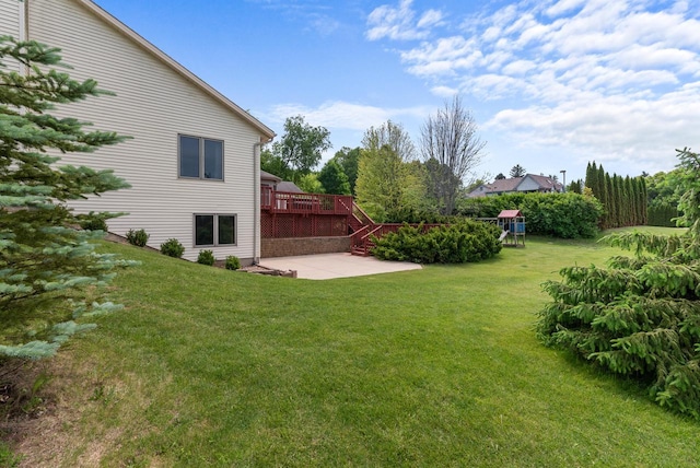 3267 Conestoga Trl, Richfield, WI 53076 - view of grassy yard featuring a patio and a deck