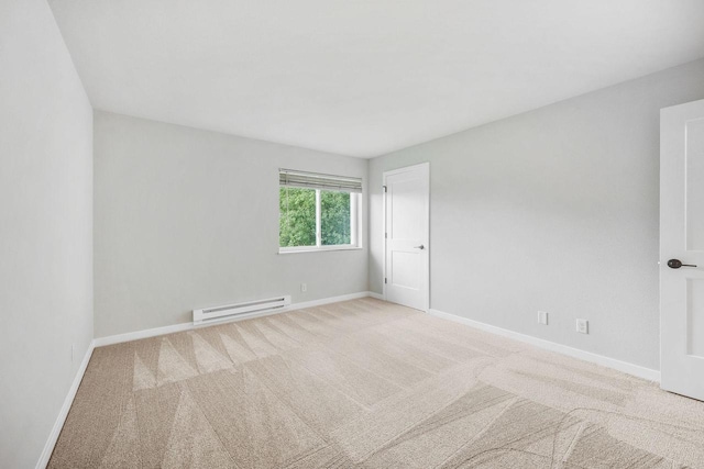 1508 Whispering Pines Way, Fitchburg, WI 53713 - spare room featuring a baseboard heating unit and carpet flooring