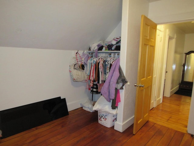 1326 N 11th St, Sheboygan, WI 53081 - spacious closet featuring hardwood / wood-style flooring and vaulted ceiling