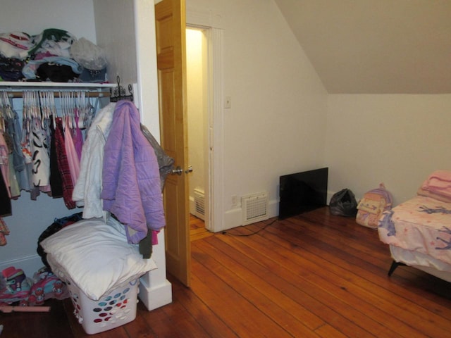 1326 N 11th St, Sheboygan, WI 53081 - bedroom featuring vaulted ceiling and hardwood / wood-style floors