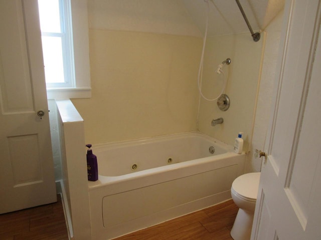 1326 N 11th St, Sheboygan, WI 53081 - bathroom with wood finished floors and a combined bath / shower with jetted tub