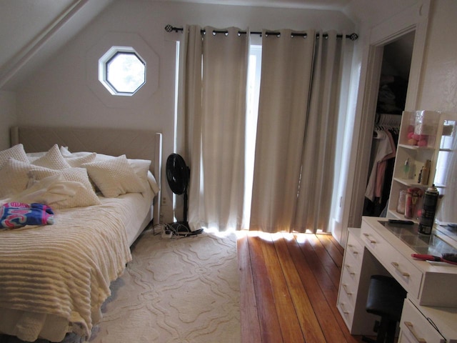 1326 N 11th St, Sheboygan, WI 53081 - bedroom featuring a desk, wood-type flooring, and lofted ceiling