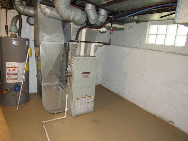 1326 N 11th St, Sheboygan, WI 53081 - utility room featuring gas water heater and heating unit