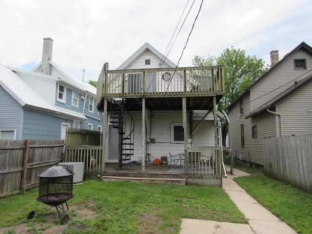 1326 N 11th St, Sheboygan, WI 53081 - back of property featuring an outdoor fire pit, a deck, and stairway