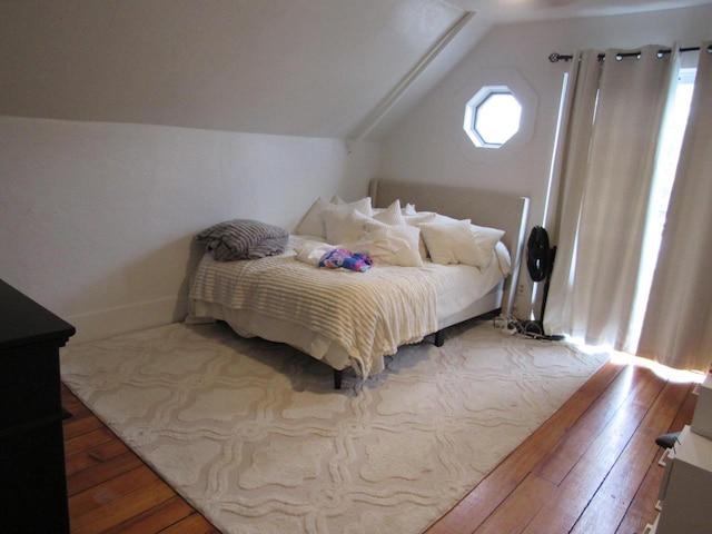 1326 N 11th St, Sheboygan, WI 53081 - bedroom with hardwood / wood-style flooring and vaulted ceiling