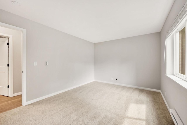 807 Whispering Pines Way, Fitchburg, WI 53713 - unfurnished room featuring baseboard heating and carpet
