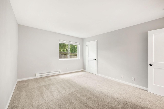 807 Whispering Pines Way, Fitchburg, WI 53713 - carpeted empty room featuring a baseboard radiator and baseboards