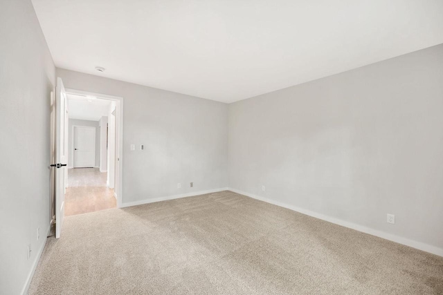 807 Whispering Pines Way, Fitchburg, WI 53713 - empty room with light colored carpet and baseboards