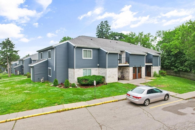 807 Whispering Pines Way, Fitchburg, WI 53713 - view of front of property featuring brick siding and a balcony
