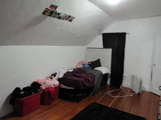 1744 N 27th St, Sheboygan, WI 53081 - bedroom featuring lofted ceiling and wood finished floors