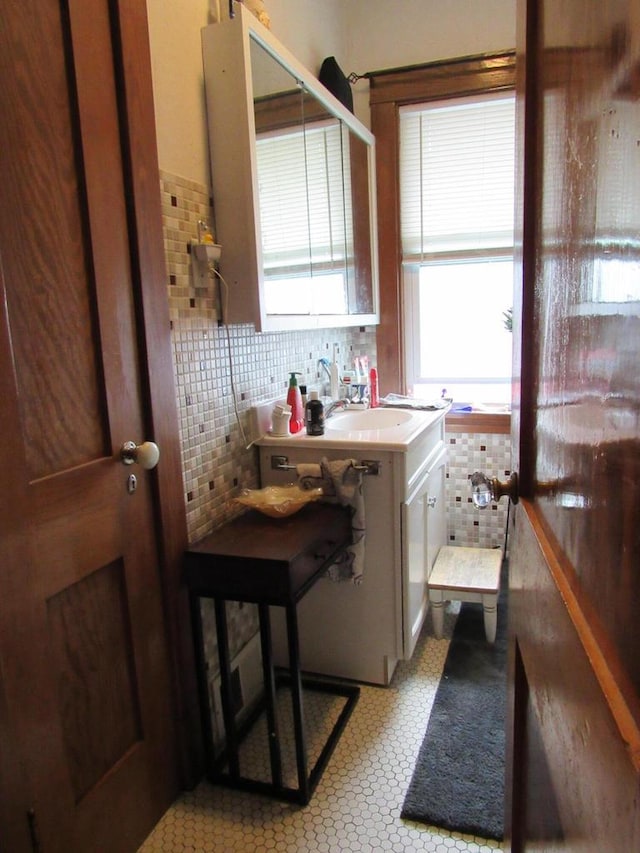 616 N 14th St, Sheboygan, WI 53081 - kitchen with plenty of natural light and tasteful backsplash