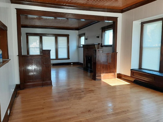 616 N 14th St, Sheboygan, WI 53081 - unfurnished living room with ornamental molding, hardwood / wood-style flooring, a fireplace with flush hearth, and wooden ceiling