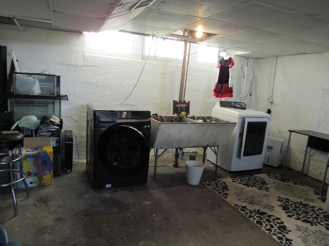 616 N 14th St, Sheboygan, WI 53081 - unfinished basement featuring separate washer and dryer and a sink