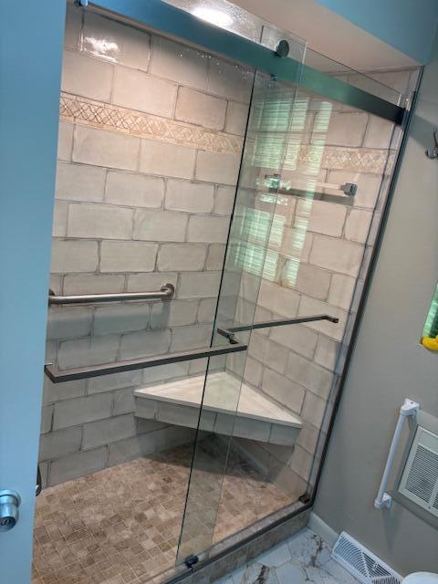 3415 N 105th St, Wauwatosa, WI 53222 - full bath featuring a shower stall and marble look tiles
