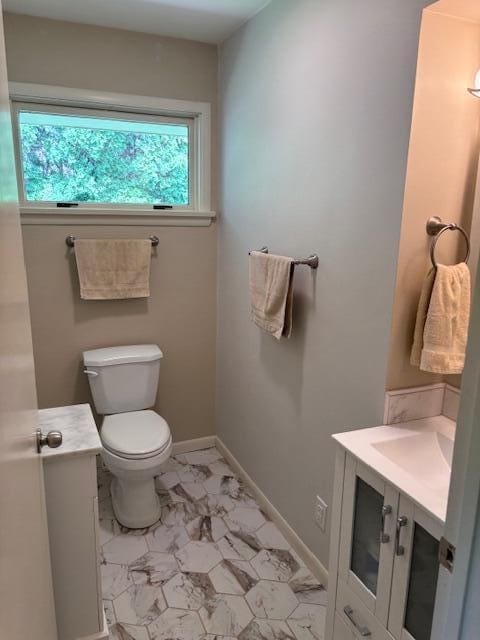 3415 N 105th St, Wauwatosa, WI 53222 - bathroom featuring vanity and marble look tile flooring