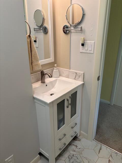3415 N 105th St, Wauwatosa, WI 53222 - bathroom with vanity and marble finish floors