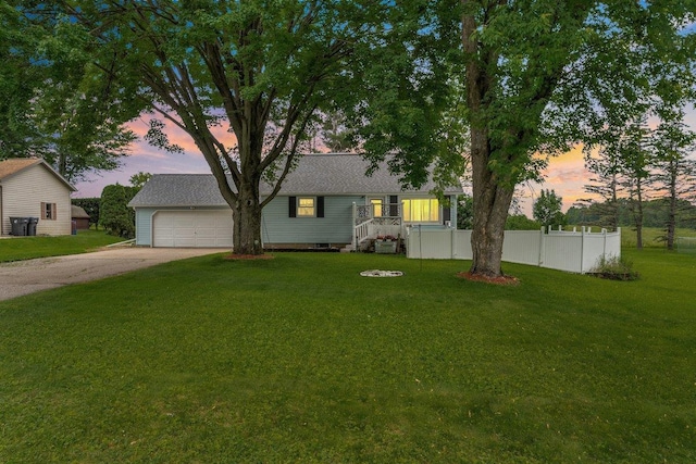 11165 Main St, Hewitt, WI 54441 - view of front of home with dirt driveway and an attached garage
