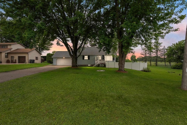 11165 Main St, Hewitt, WI 54441 - view of front of property with concrete driveway and a garage