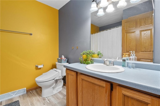 3713 Kingswood Ct, Eau Claire, WI 54701 - bathroom with vanity and wood finished floors