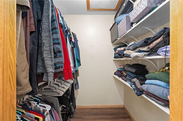 3713 Kingswood Ct, Eau Claire, WI 54701 - walk in closet with wood finished floors and attic access