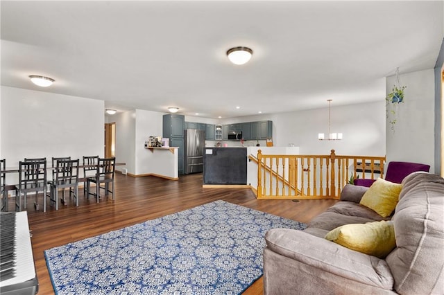 3713 Kingswood Ct, Eau Claire, WI 54701 - living area with dark wood-type flooring and a chandelier