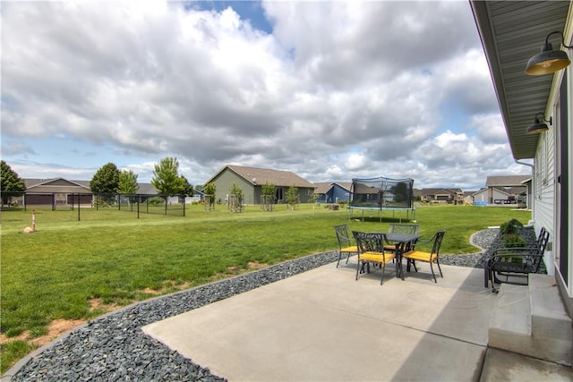 1040 Wissota Green Pkwy, Chippewa Falls, WI 54729 - view of patio with a trampoline and a residential view