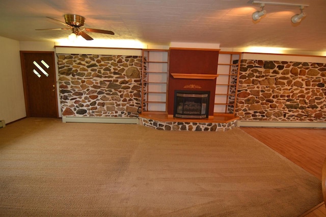 3917 Ross Ave, Weston, WI 54401 - unfurnished living room with a glass covered fireplace, a ceiling fan, and wood finished floors
