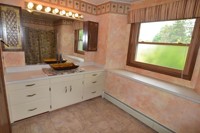 3917 Ross Ave, Weston, WI 54401 - bathroom featuring a baseboard heating unit, vanity, and tiled shower