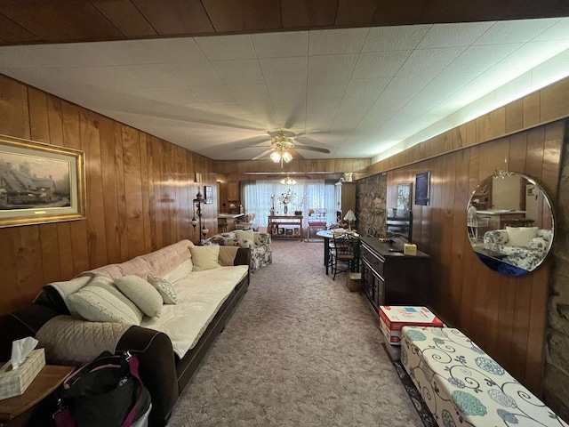 3917 Ross Ave, Weston, WI 54401 - carpeted living room with wooden walls and ceiling fan