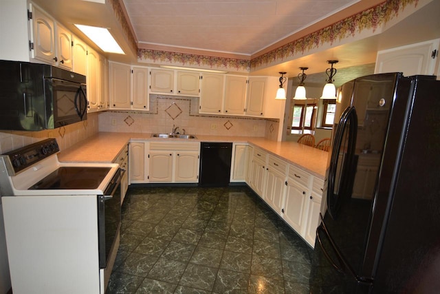 3917 Ross Ave, Weston, WI 54401 - kitchen with black appliances, tasteful backsplash, light countertops, pendant lighting, and white cabinets