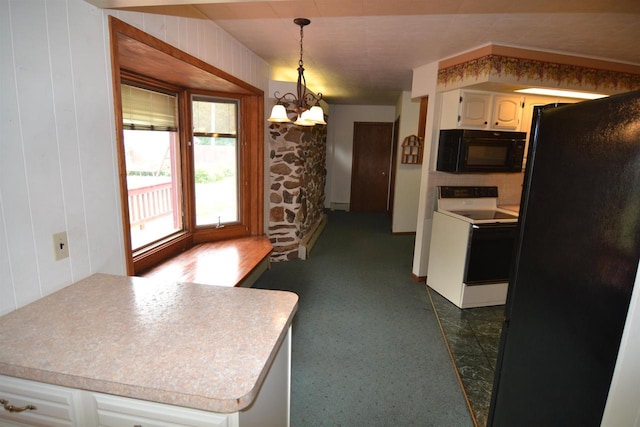 3917 Ross Ave, Weston, WI 54401 - kitchen with black appliances, white cabinets, a chandelier, hanging light fixtures, and light countertops