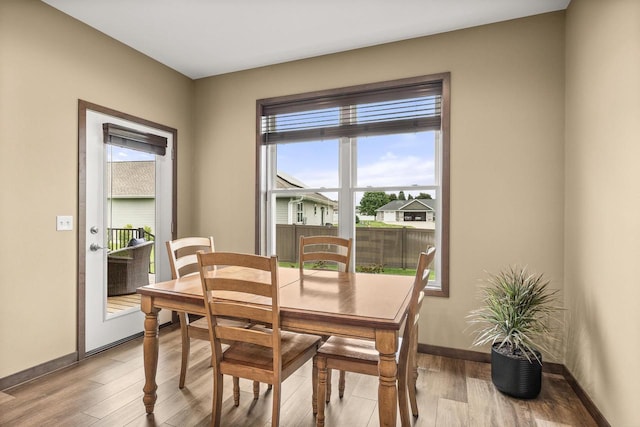 3830 Augusta Ct, Plover, WI 54467 - dining room featuring plenty of natural light and light wood-style floors