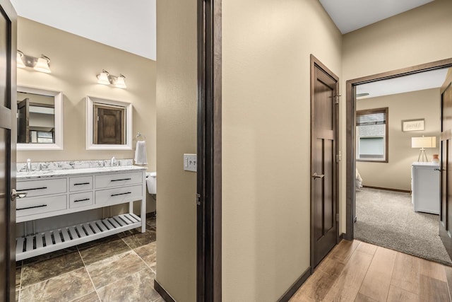 3830 Augusta Ct, Plover, WI 54467 - full bathroom with toilet and double vanity