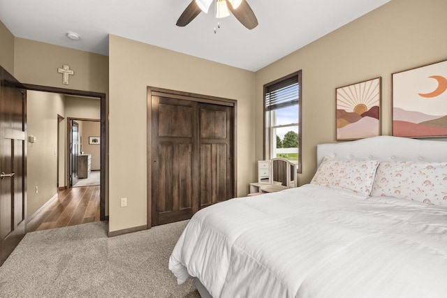 3830 Augusta Ct, Plover, WI 54467 - carpeted bedroom with a closet and ceiling fan