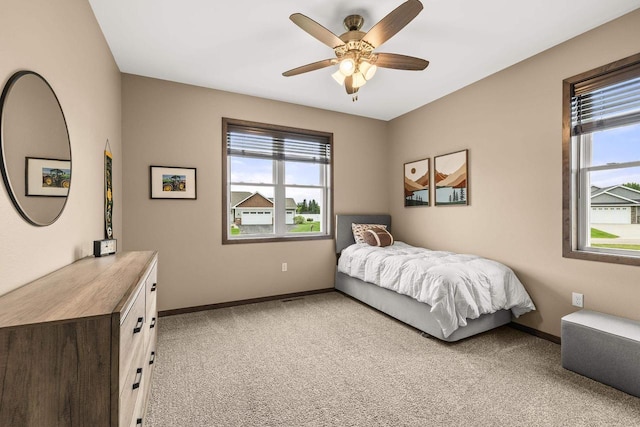 3830 Augusta Ct, Plover, WI 54467 - bedroom featuring light carpet and ceiling fan
