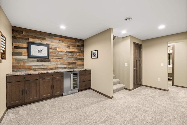 3830 Augusta Ct, Plover, WI 54467 - indoor dry bar featuring beverage cooler, stairs, light carpet, recessed lighting, and wood walls