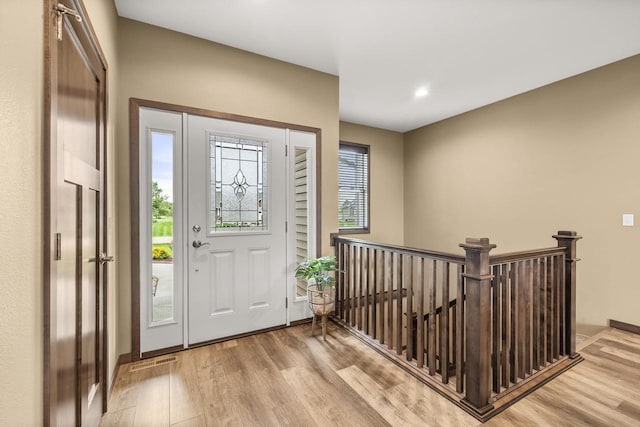3830 Augusta Ct, Plover, WI 54467 - entrance foyer featuring wood finished floors and recessed lighting