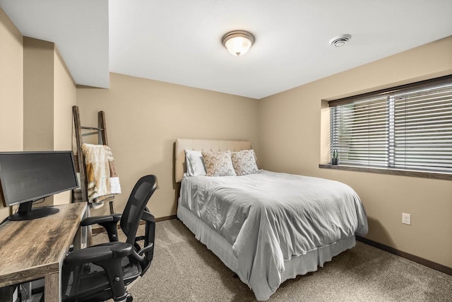 3830 Augusta Ct, Plover, WI 54467 - carpeted bedroom with baseboards and a desk