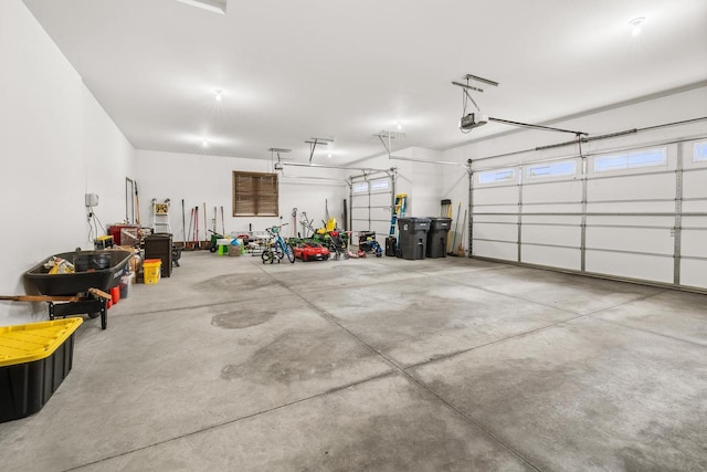 3830 Augusta Ct, Plover, WI 54467 - garage featuring a garage door opener