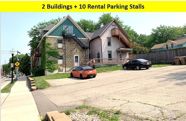 522-524 E Main St, Madison, WI 53703 - view of front of house featuring stone siding and uncovered parking