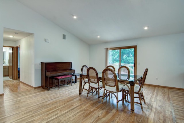 8103 W Folsom St, Eau Claire, WI 54703 - dining space with light wood-style floors, recessed lighting, and vaulted ceiling