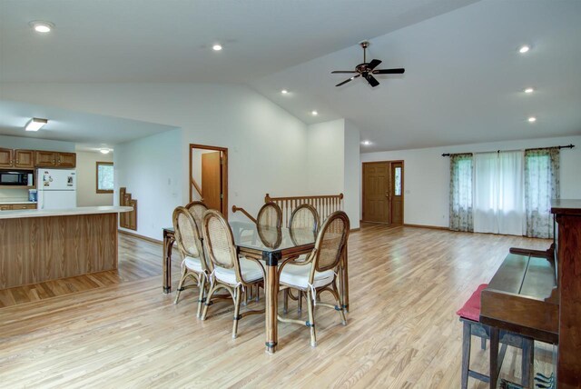 8103 W Folsom St, Eau Claire, WI 54703 - dining space featuring light wood-style floors, a ceiling fan, recessed lighting, and high vaulted ceiling