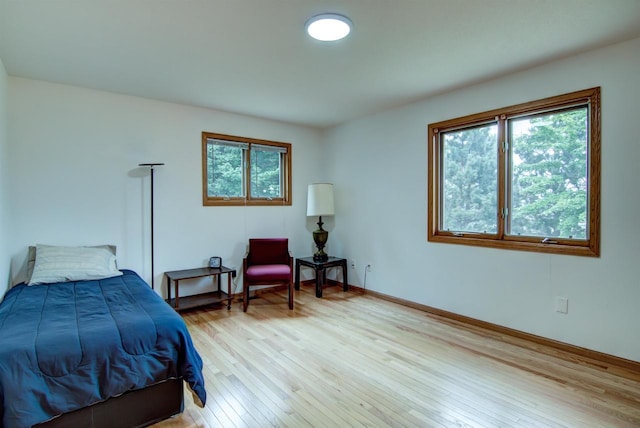 8103 W Folsom St, Eau Claire, WI 54703 - bedroom featuring light wood-style flooring and baseboards