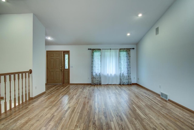 8103 W Folsom St, Eau Claire, WI 54703 - unfurnished living room featuring wood finished floors and recessed lighting