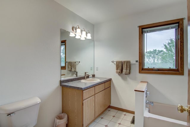8103 W Folsom St, Eau Claire, WI 54703 - bathroom with plenty of natural light, a bath, vanity, and tile patterned floors