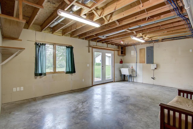 8103 W Folsom St, Eau Claire, WI 54703 - below grade area featuring electric panel and french doors